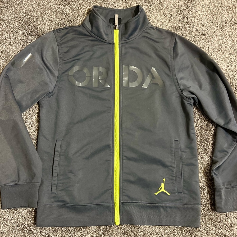 Jordan gray and green kid’s zip up jacket… pre owned